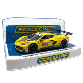 Yellow Chevrolet Corvette C8R race car model on a display base for Scalextric C4246