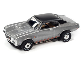Silver and black slot car, side view, on white background for Auto World SC379