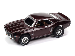 Dark maroon slot car, viewed from the side, on white background for Auto World ex SC384