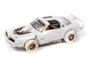 White slot car with gold accents, viewed from the side for Auto World SC402