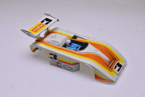 Model race car, white and orange, with "Goodyear" visible on the hood for Aurora AFX1768