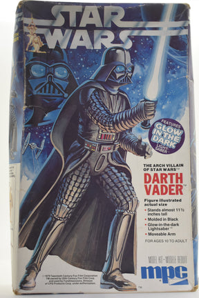 Darth Vader action figure kit box art, showing the villain with a lightsaber for MPC