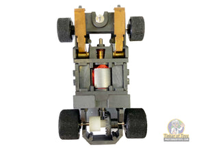 Narrow chassis with visible motor and wheels for building for Tyco