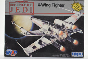 X-Wing Fighter model kit box art featuring the starship against a space backdrop for MPC Models MPC8932